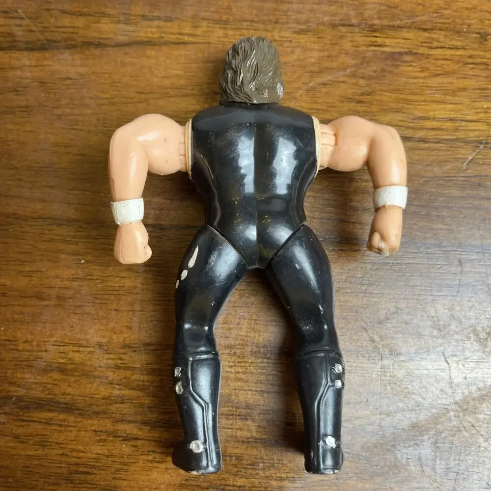 Two (2) 1990s Wrestling Figures. Used As-Is. Moveable Arms And Legs. WWE Style